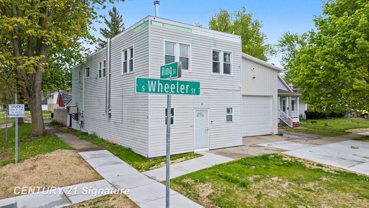 Property Photo:  1300 S Wheeler Street  MI 48602 