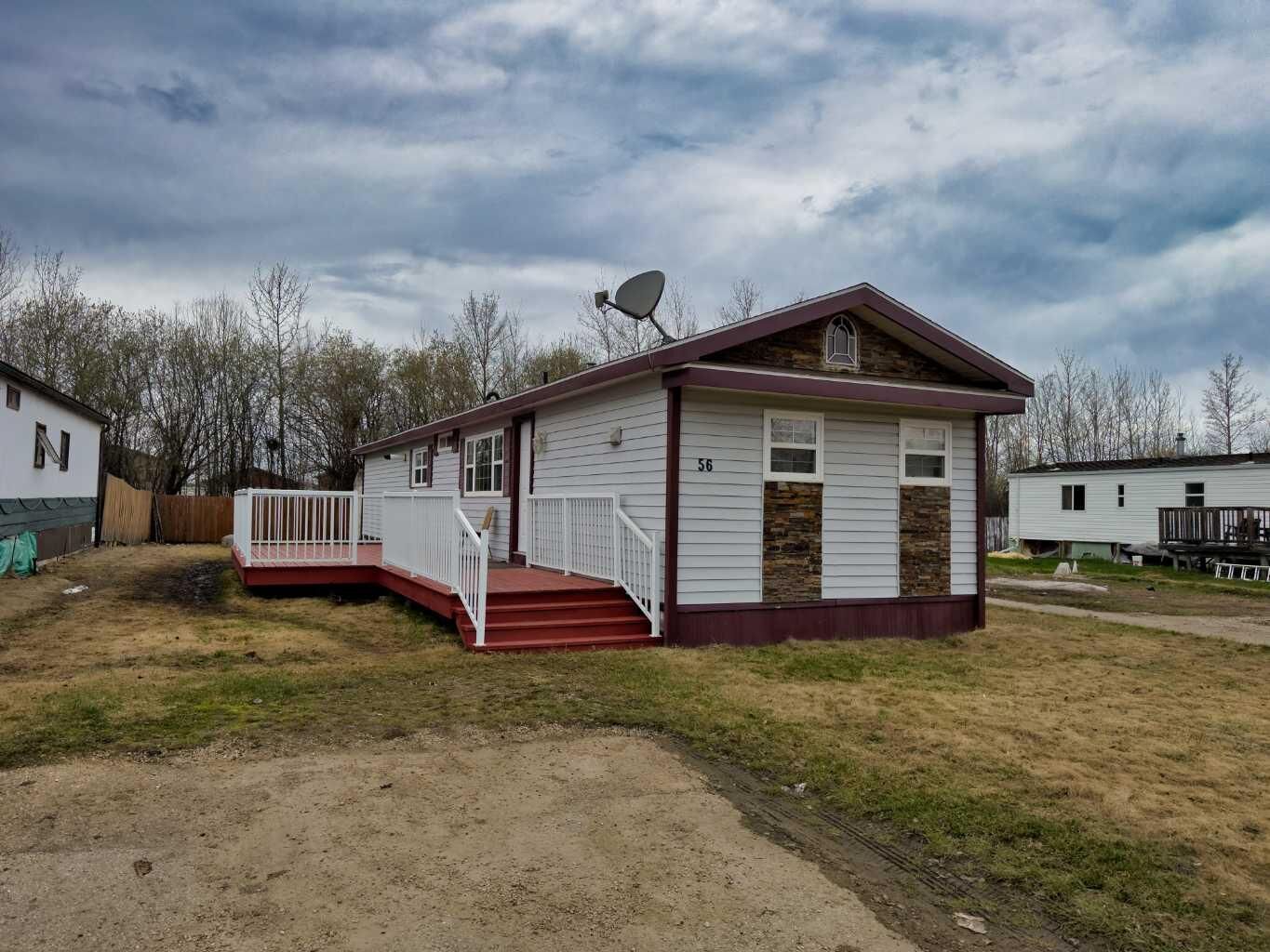 Property Photo:  812 6 Avenue SW 56  AB T0G 2A4 