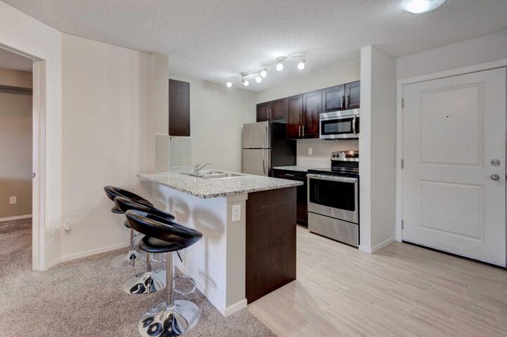 Property Photo:  81 Legacy Boulevard SE 2125  AB T2X 2B9 