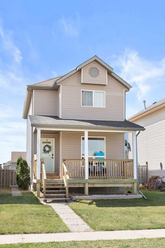 Property Photo:  241 Upland Boulevard W  AB T1R 0R1 