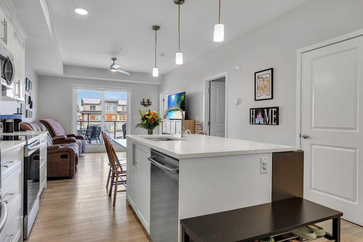 Property Photo:  370 Harvest Hills Common NE 206  AB T3K 2M8 