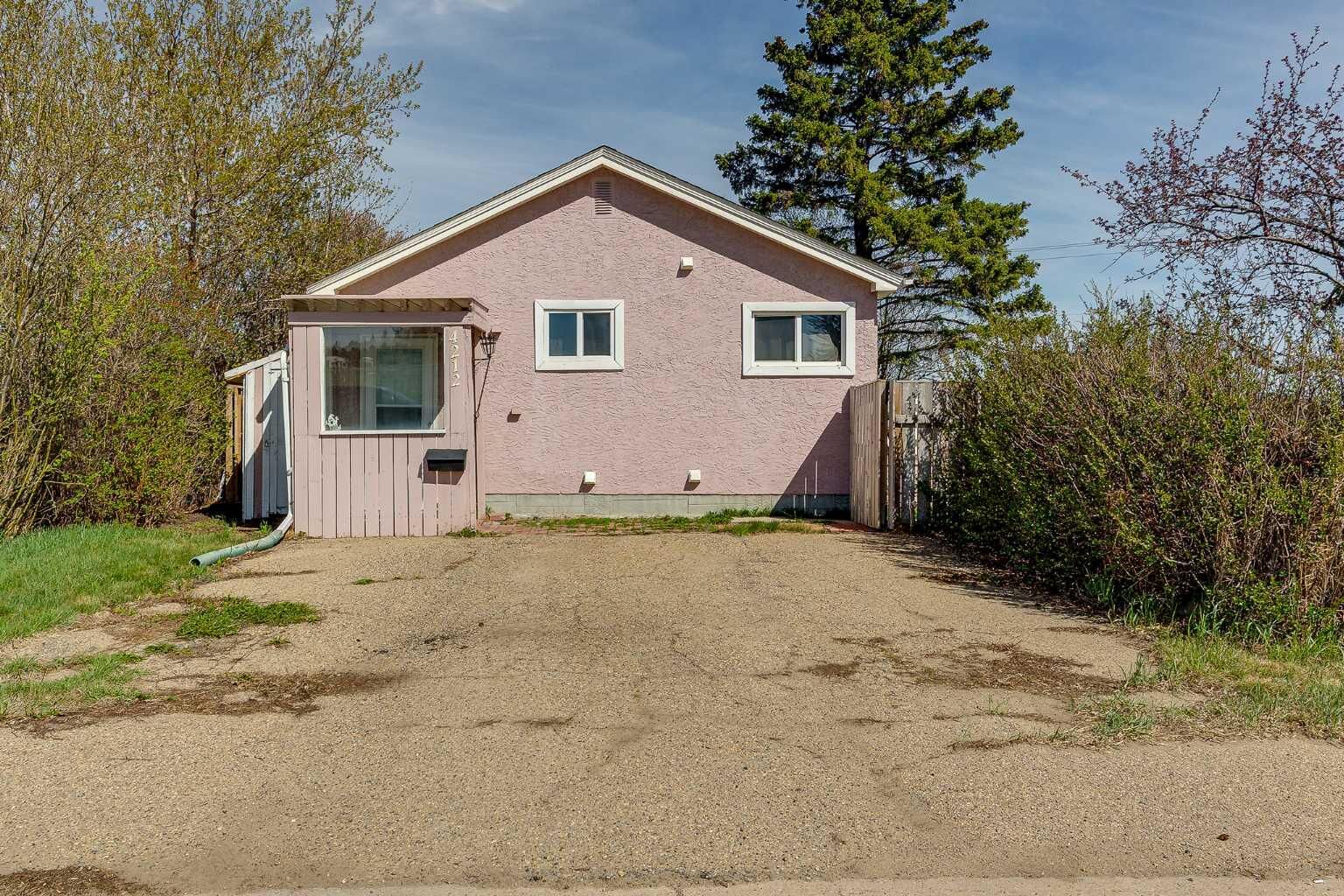 Property Photo:  4212 C + E Trail  AB T4L 1V8 