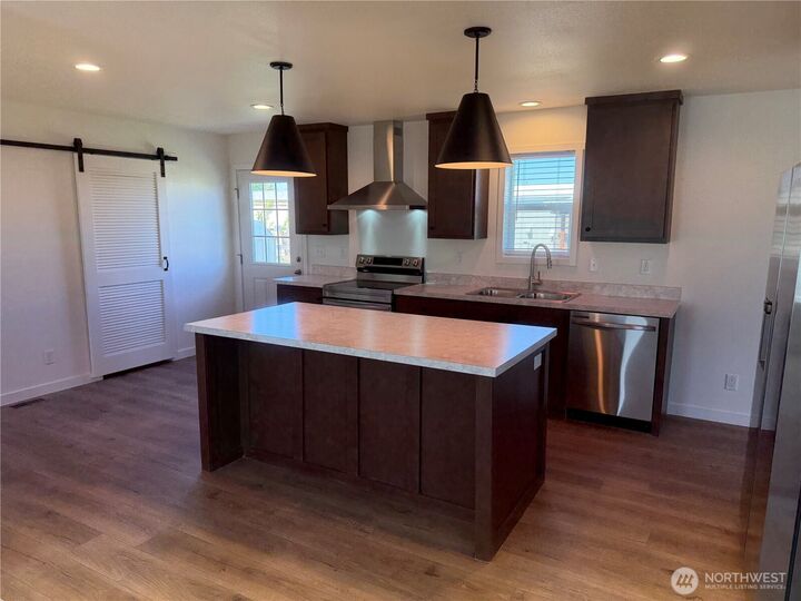 Property Photo:  205  Pleasant Avenue 44  WA 98930 