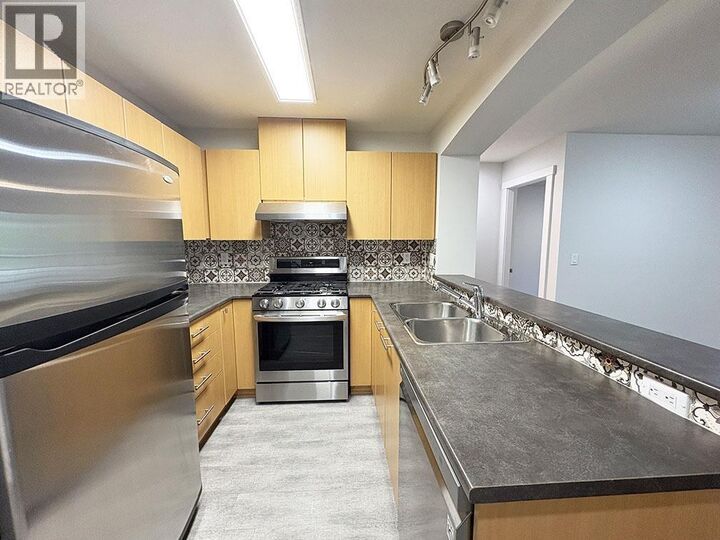 Property Photo: 9339 University Crescent 316 BC V5Y 4Y1