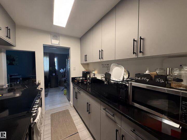 Property Photo:  12409 82 Street NW 102  AB T5B 2X5 