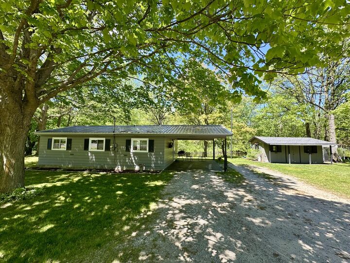 Property Photo: 8942 E M-20 MI 49421