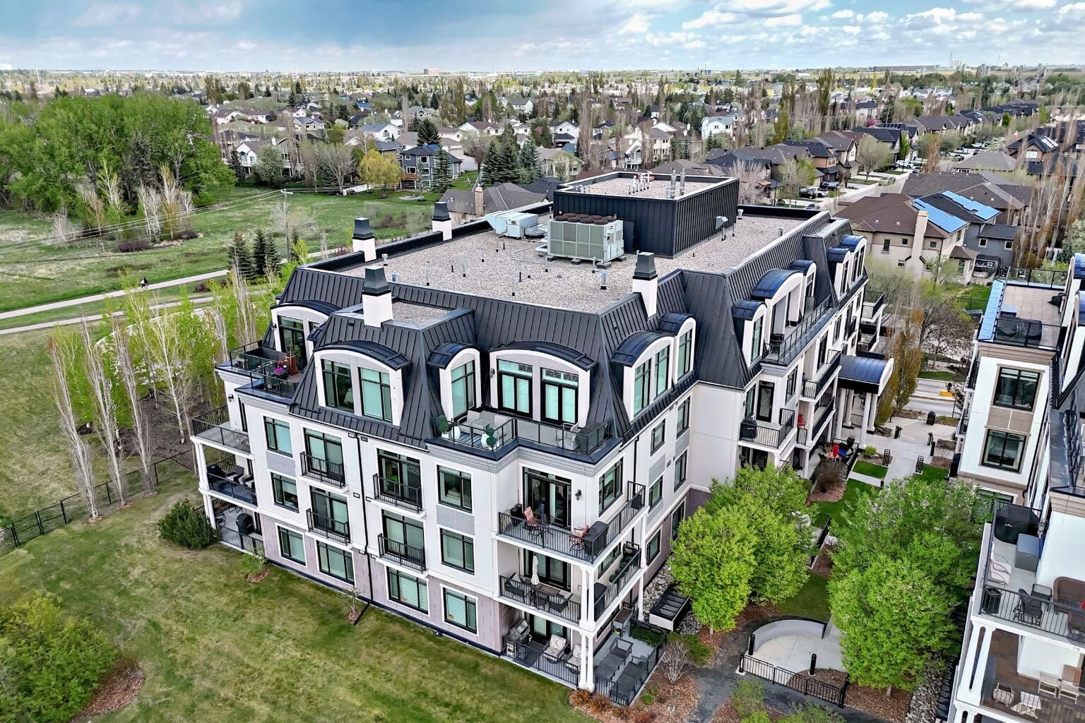 Property Photo:  121 Quarry Way SE 105  AB T2C 5J1 