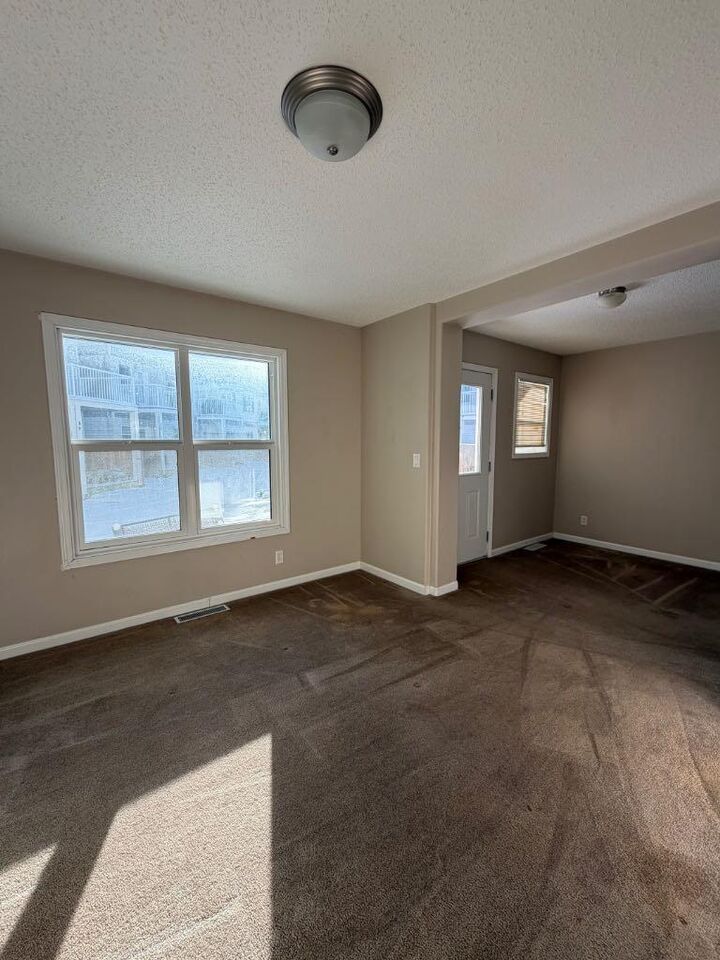 Property Photo:  313 Millennium Drive 84  AB T9K 0M2 