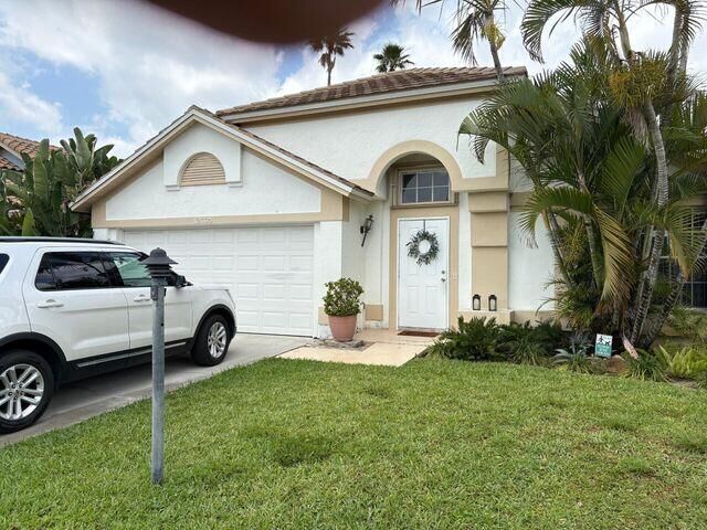 Property Photo:  12665 Coral Breeze Drive  FL 33414 
