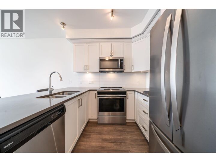 Property Photo:  2436 Kelly Avenue 314  BC V3C 1Y4 