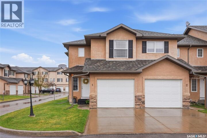 Property Photo:  1 118 Pawlychenko Lane  SK S7V 1K1 