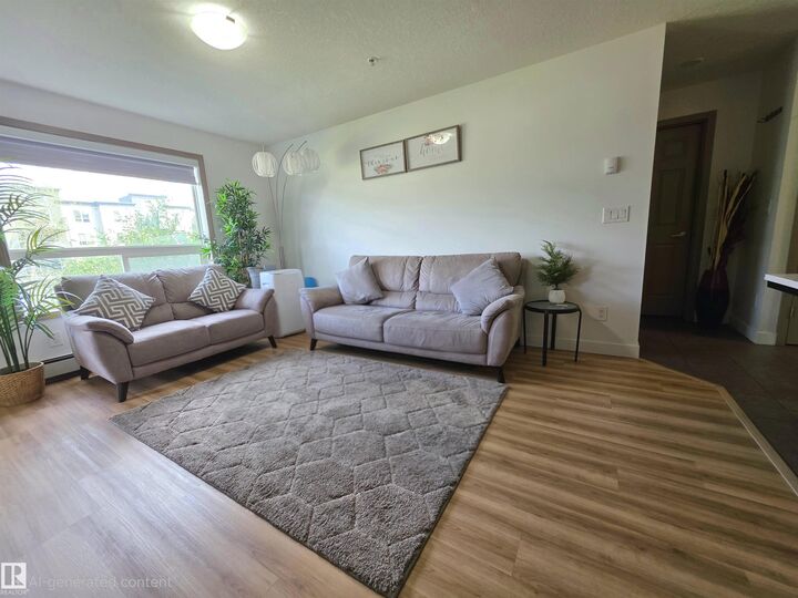 Property Photo:  5005 165 Avenue NW 210  AB T5Y 0L8 