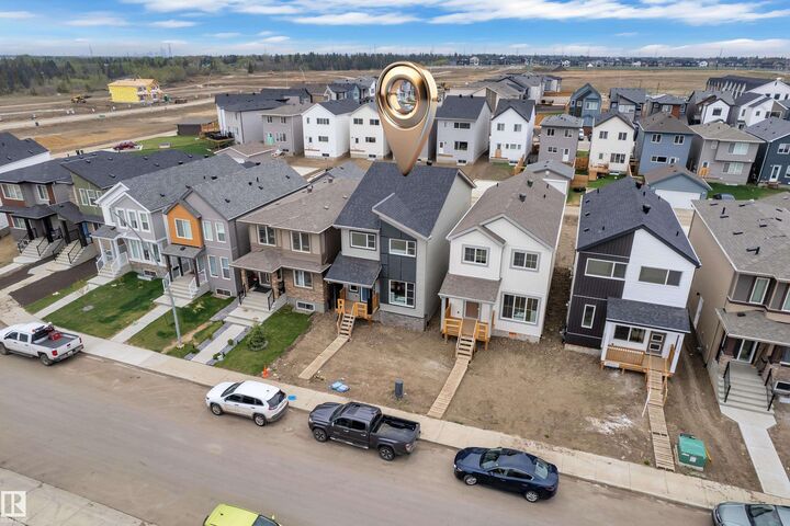 Property Photo:  17330 6A Street NE  AB T5Y 4E8 