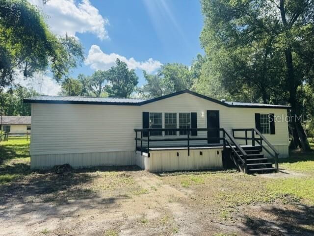 Property Photo: 11898 SW 36th Way FL 33597