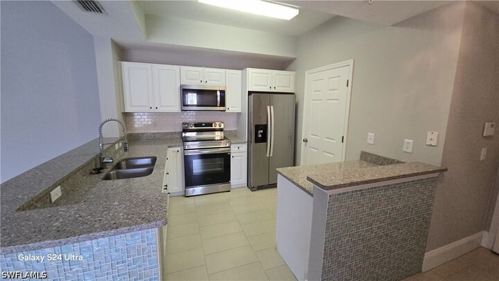 Property Photo: 9015 Colby Drive 2021 FL 33919
