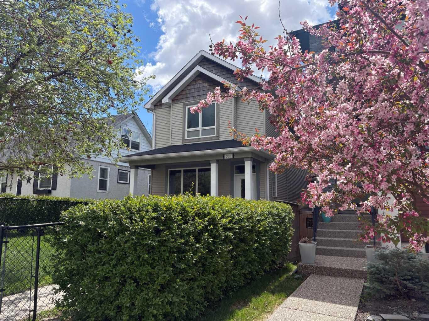Property Photo:  703 52 Avenue SW  AB T2V 0B6 