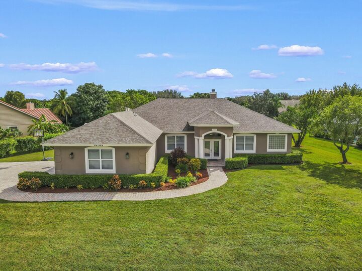 Property Photo:  15705 Meadow Wood Drive  FL 33414 