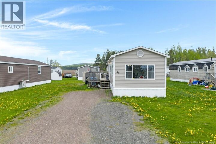 Property Photo: 58 Orchard Crescent NB E4E 3X7