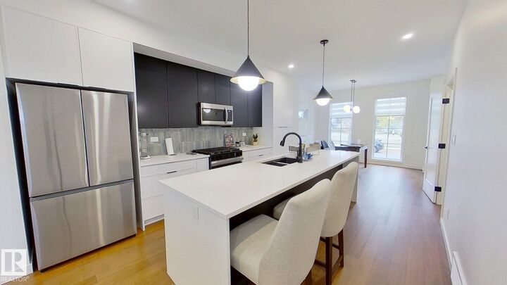 Property Photo:  11308 128 Street NW  AB T5M 0W9 
