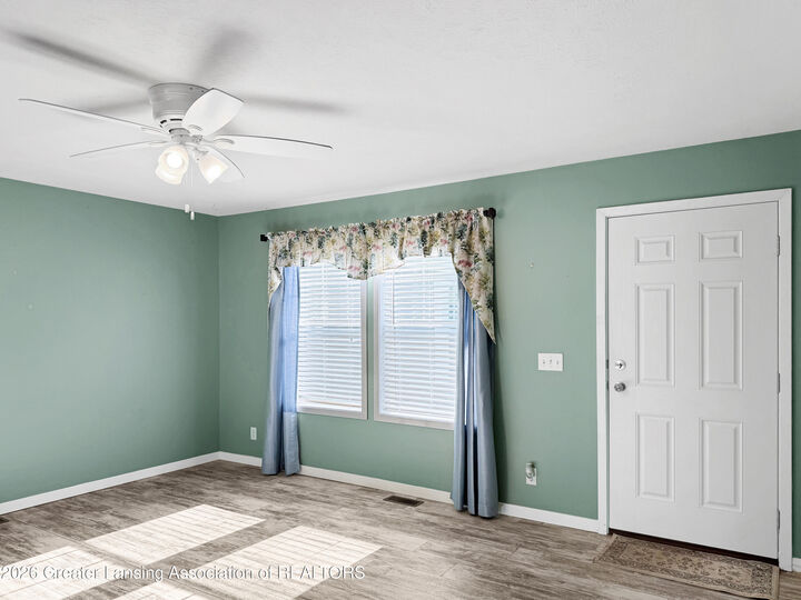 Property Photo:  2105 Burton Avenue  MI 48842 