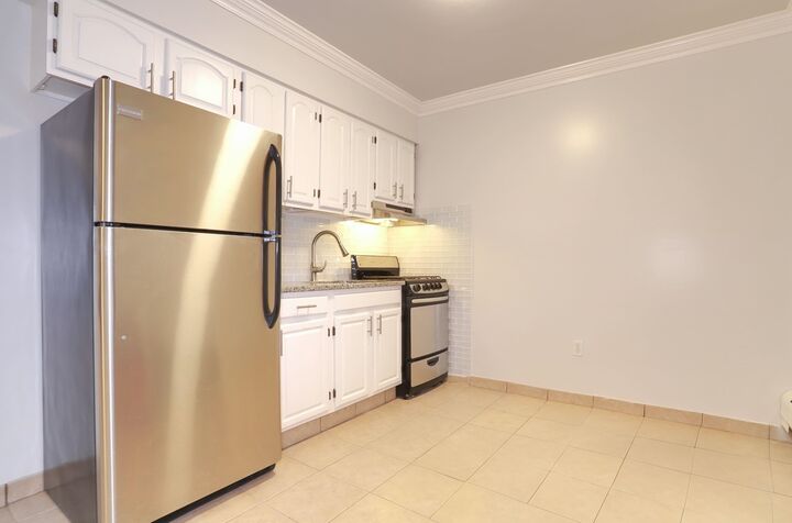 Property Photo:  6311 Dewey Ave 1  NJ 07093 