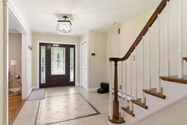 Property Photo:  60 Tulipwood Drive  NY 11725 