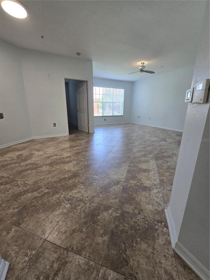 Property Photo:  5506 Metrowest Boulevard 13-103  FL 32811 