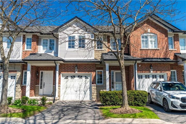 Property Photo: 232 Stonehenge Drive 26 ON L9K 1R5