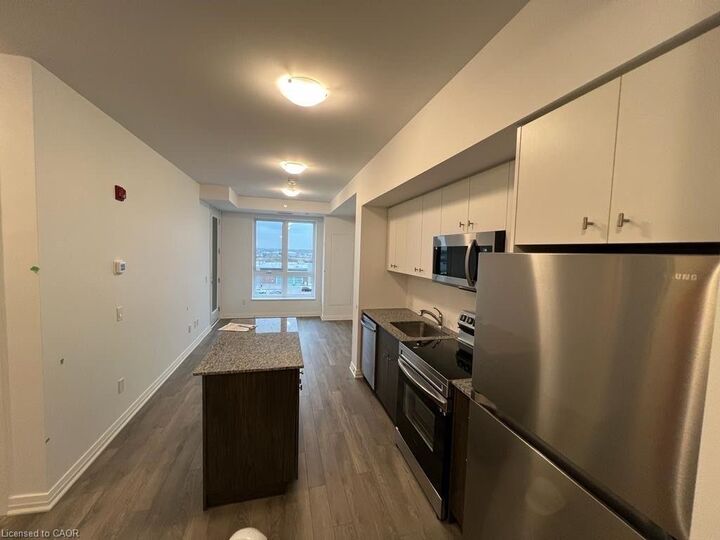 Property Photo:  101 Golden Eagle Road 410  ON N2V 0H4 