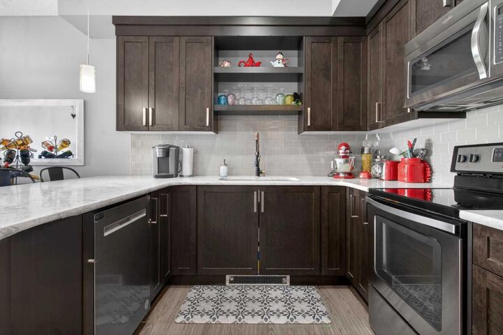 Property Photo:  6603 New Brighton Avenue SE 105  AB T2Z 5E5 