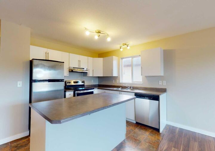 Property Photo: 13013 95 Street AB T8X 1R9