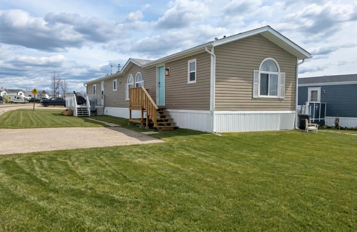 Property Photo: 142 Clark Crescent AB T8W 5K5