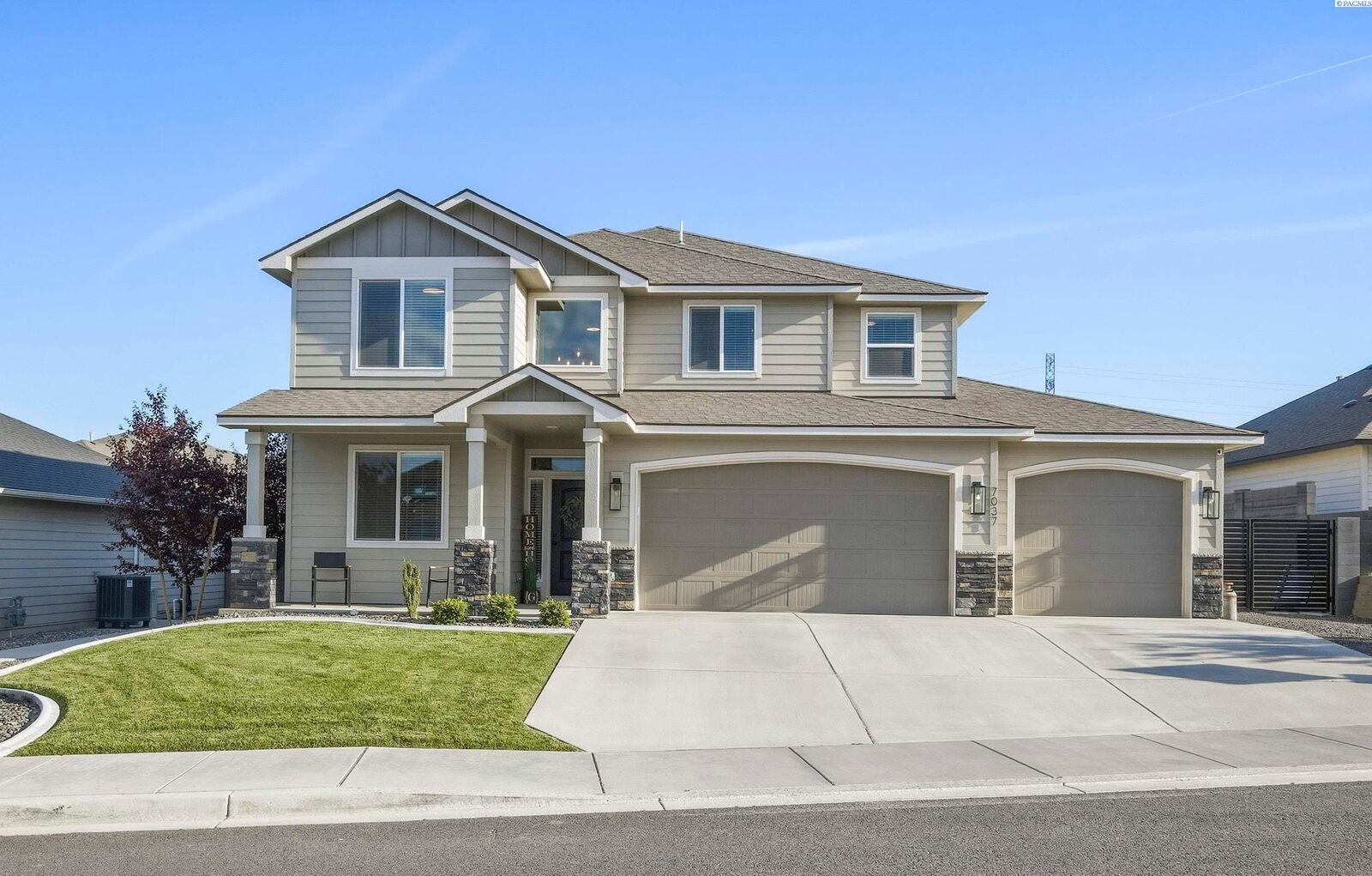 Property Photo:  7037 W 35th Ave  WA 99338 