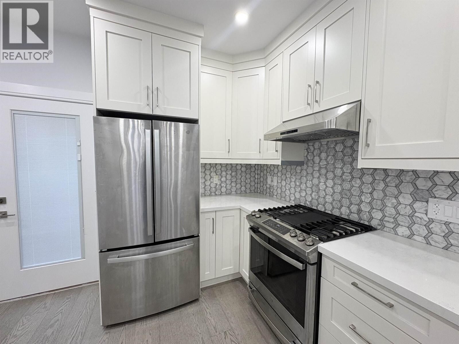Property Photo:  4990 Moss Street  BC V5R 3T4 