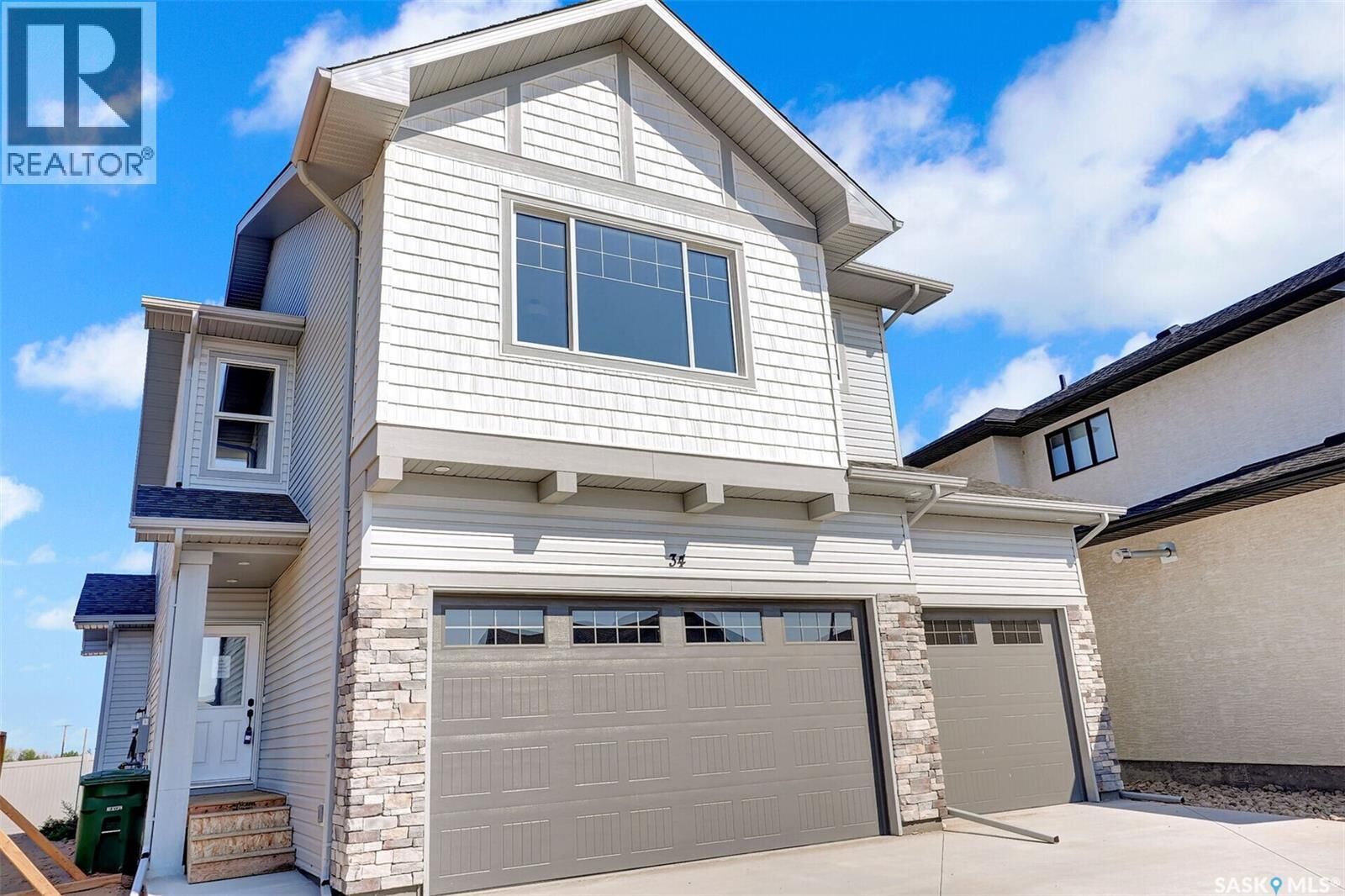 Property Photo:  266 Kostiuk Crescent  SK S7V 2A3 