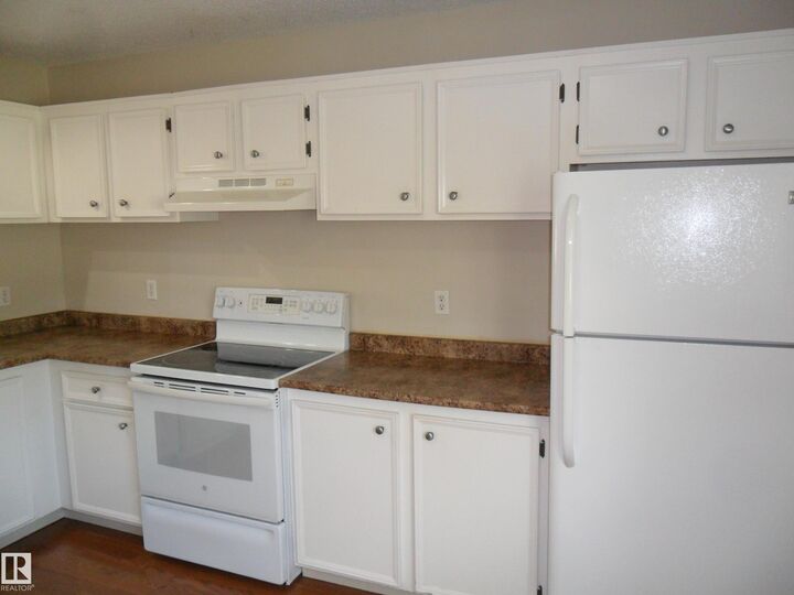 Property Photo: 8930 99 Avenue AB T8L 3L1