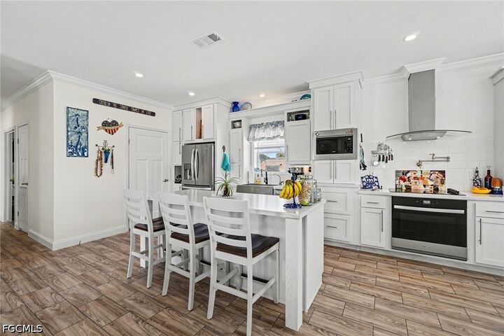 Property Photo:  11301 Bayside Boulevard  FL 33931 