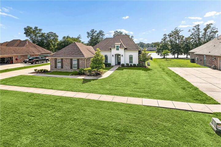 Property Photo:  286 Saw Grass Loop  LA 70435 