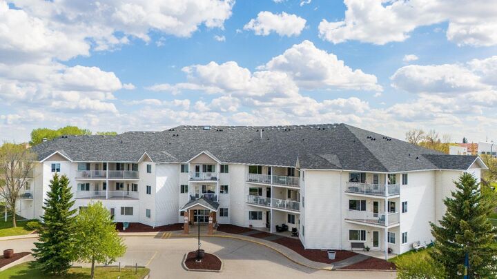 Property Photo:  3 Parklane Way 215  AB T1P 1N6 