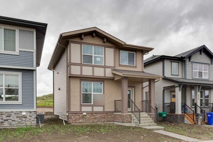 Property Photo: 422 Heartland Way AB T4C 3E5