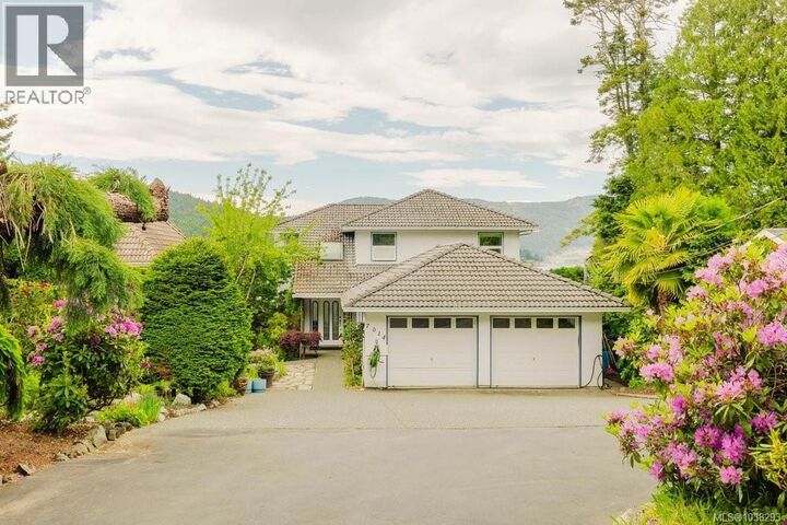 Property Photo:  7014 Brentwood Drive  BC V8M 1B4 