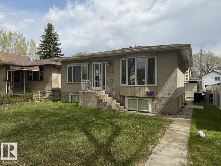 Property Photo:  11839 56 Street NW  AB T5W 3S7 