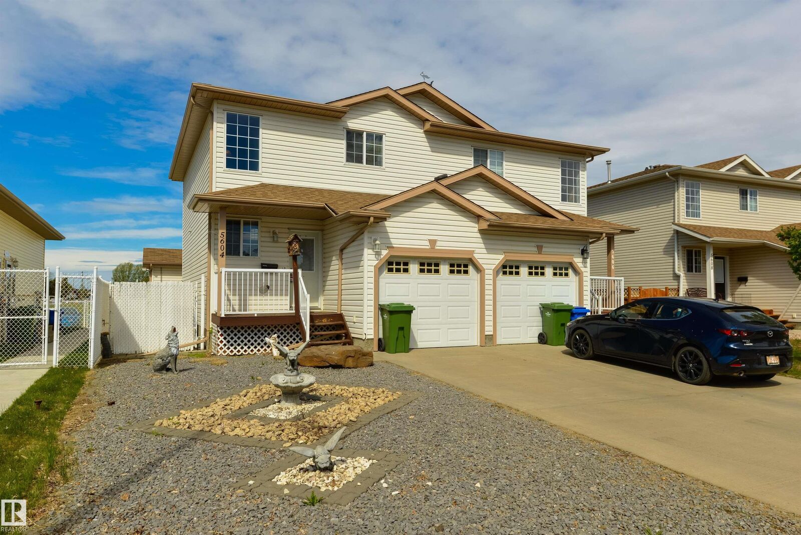 Property Photo: 5604 Garden Meadows Drive AB T9A 3S5