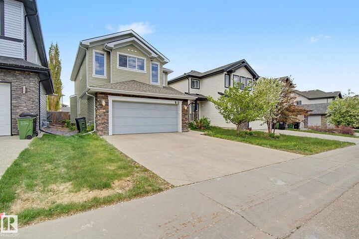 Property Photo: 1932 67 Street SW AB T6X 0L9