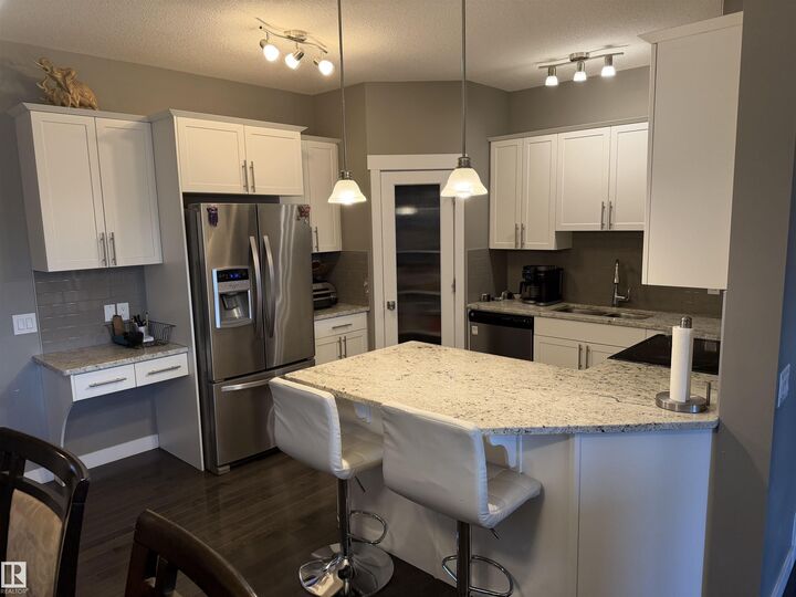 Property Photo:  7028 174 Avenue NW  AB T5Z 0L3 