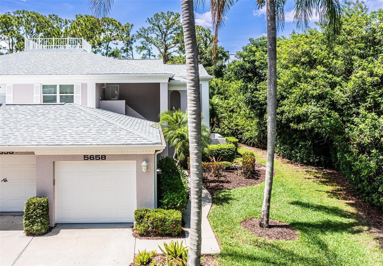 Property Photo:  5658 Sheffield Greene Circle 66-17  FL 34235 