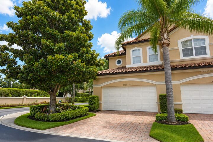 Property Photo:  8766 The Esplanade 23  FL 32836 