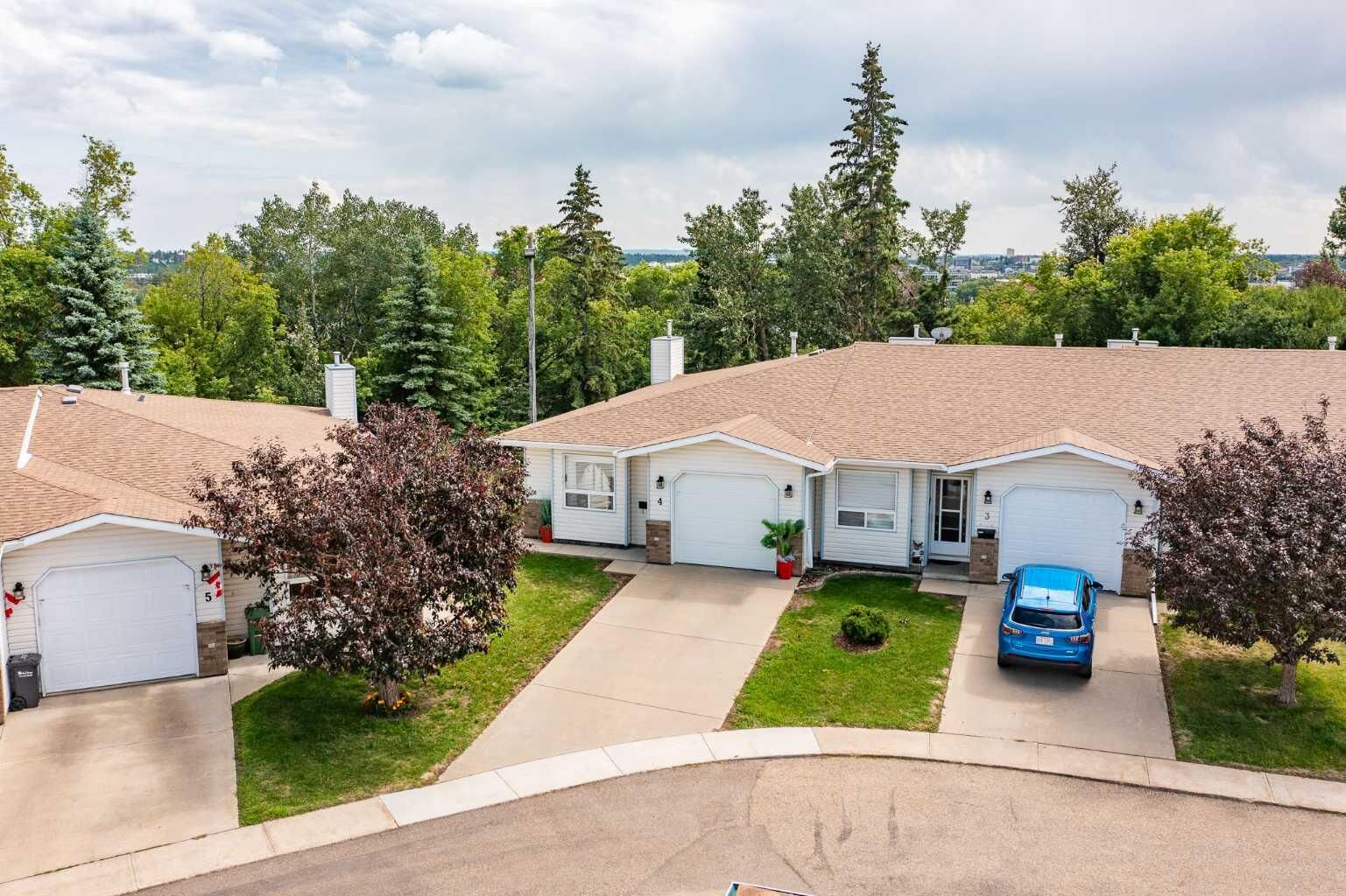 Property Photo:  5125 62 Street 4  AB T4N 6Y3 