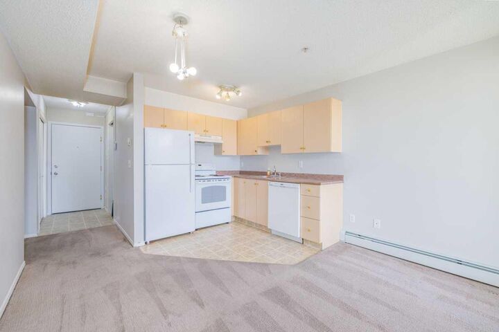 Property Photo: 1717 60 Street SE 113 AB T2A 7Y7
