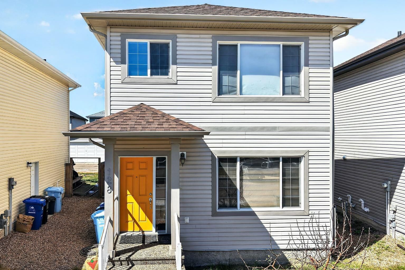 Property Photo:  128 Juniper Street  AB T9K 0M8 
